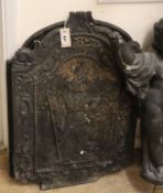Two cast iron fire backs larger 76cm high