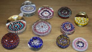 Eleven millefiori paperweights