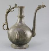 An 18th/19th century Mughal bronze and copper ewer, with stylised bird's head spout and handle, 11.