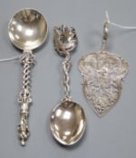 A Victorian silver 'apostle' spoon with pierced stem, London 1888, Francis Higgins III and two other