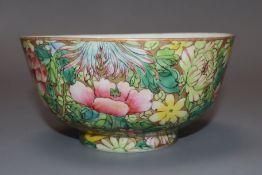 A Chinese famille rose 'Thousand Flower' bowl, Qianlong mark, early 20th century