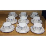 A Shelley's 1930's 'Blue Iris' pattern Queen Anne style part tea service comprising nine cups and