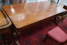 A 19th century French mahogany centre table on X end standards L.186cm