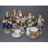 A pair of Samson figures of a couple, three small Thuringien figures and two miniature cups and