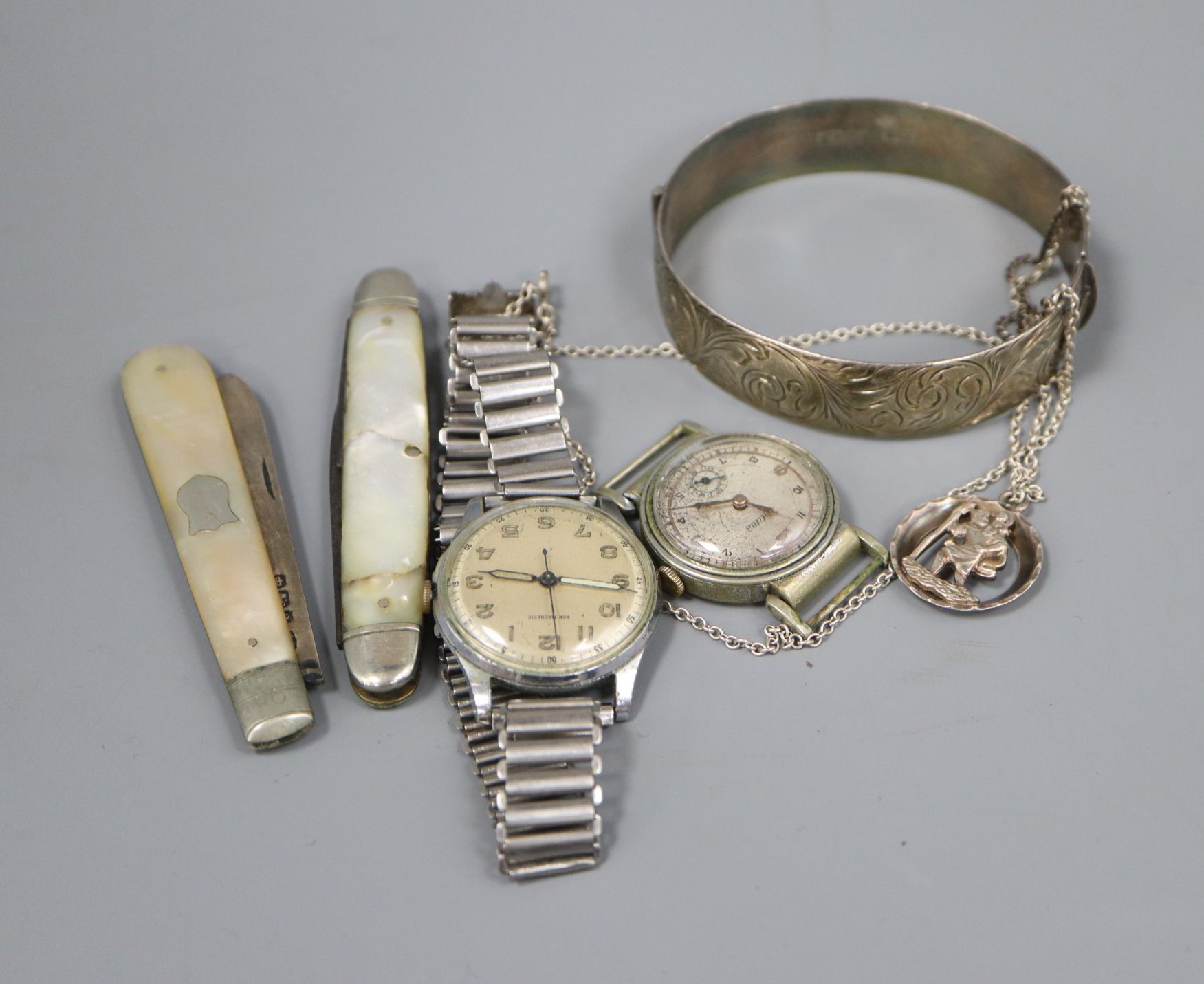 A quantity of watches, fruit knives etc.