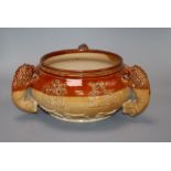 A 19th century Lambeth stoneware bowl, with three 'lion' handles height 12cm
