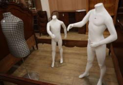 Two life-size child mannequins together with a tailor's dummy largest 142cm high