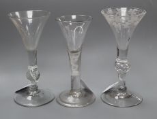 Three 18th century drinking glasses, various, comprising one with vineous-engraved trumpet bowl on