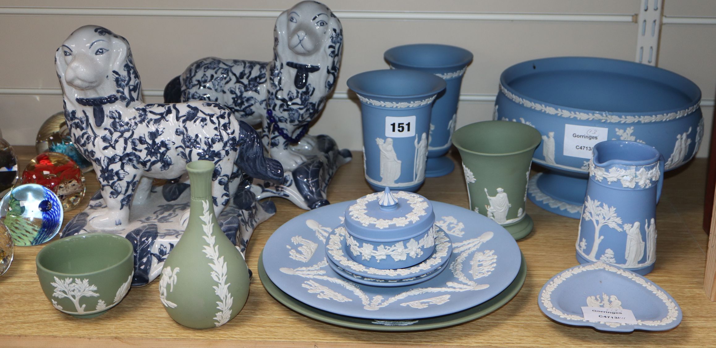 A collection of thirteen pieces of green and pale blue Wedgwood jasper pottery and a pair of ceramic