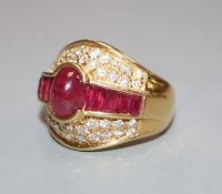 A modern 18ct gold, ruby and diamond cluster dress ring, size K