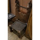 An African carved hardwood tribal chair