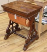 A Victorian mahogany folding work table W.61cm
