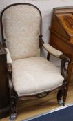 A pair of 19th century Louis XIV revival walnut and ormolu mounted armchairs