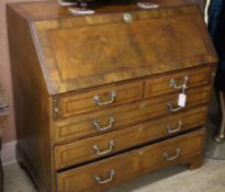 An 18th century style walnut bureau W.98cm