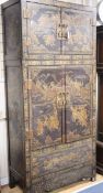 A late 19th century Chinese quing dynasty gilt decorated lacquer compound cabinet with upper hat