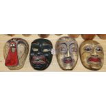 Four Chinese painted carved wood masks