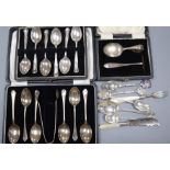 Two cased sets of silver teaspoons including one with tongs, a silver spoon & pushers and small