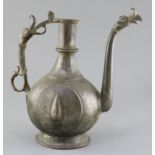 An 18th/19th century Mughal bronze and copper ewer, with stylised bird's head spout and handle, 11.