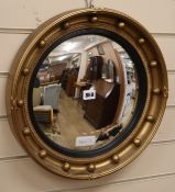 A Regency style convex mirror Diam.42cm