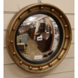 A Regency style convex mirror Diam.42cm