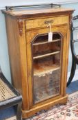 A Victorian walnut music cabinet W.52cm