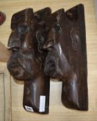 A pair of figural carvings (possibly mounts from furniture)