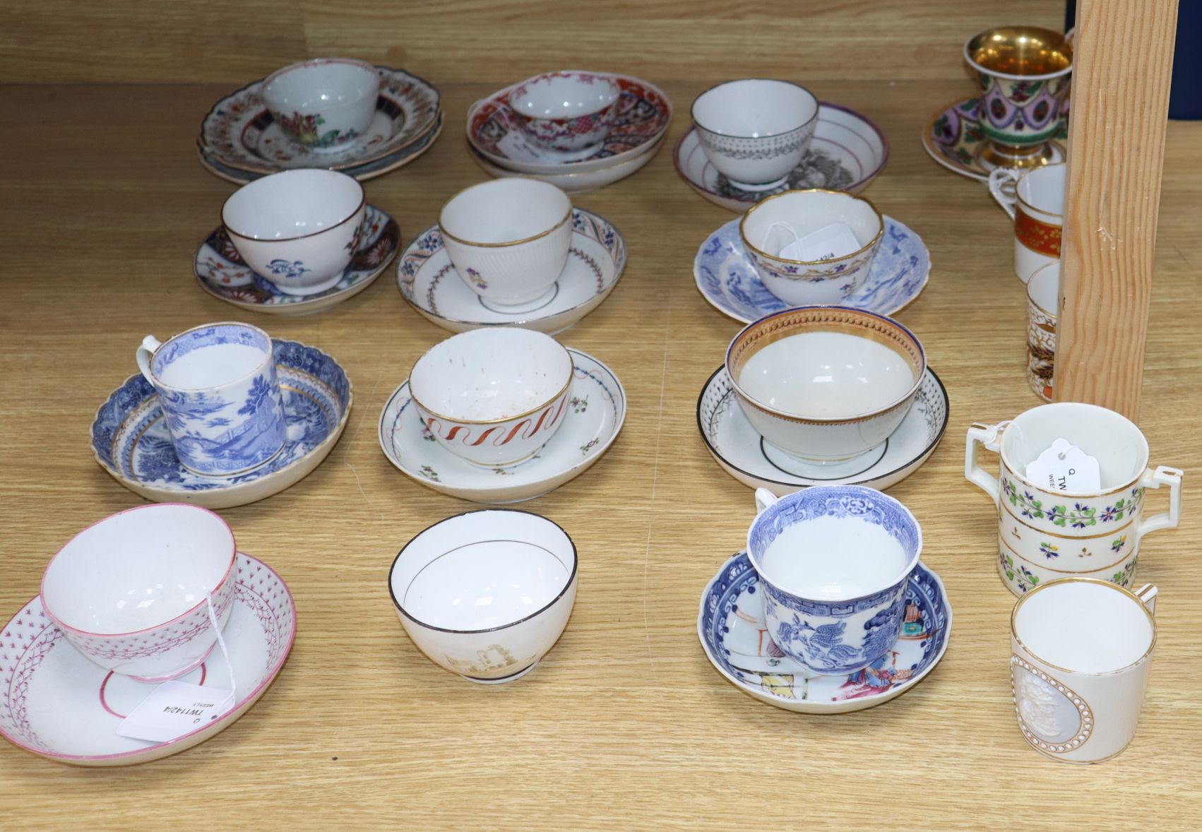 A collection of miscellaneous English and Chinese porcelain tea bowls, saucers, coffee cans and