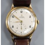 A gentleman's 1940's 9ct gold Omega Automatic wrist watch, with subsidiary seconds, movement c.