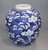 A large 19th century Chinese blue and white 'prunus' jar, Kangxi mark height 26cm, lacking cover