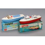 A Sutcliffe Tiger speedboat model and a Jupiter pilot cruiser model, boxed