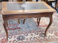 A 19th century French walnut writing table W.110cm