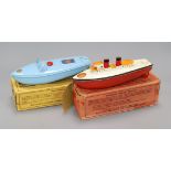 Two Sutcliffe models, a Comet speedboat and a clockwork boat, boxed