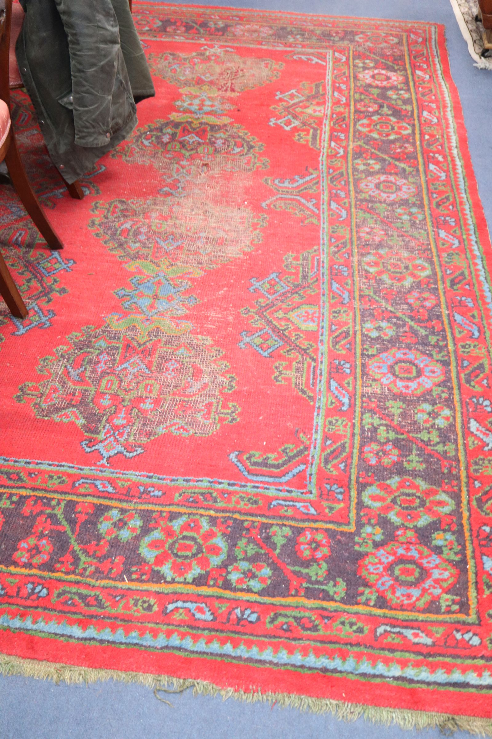 A Turkish red ground carpet, early 20th century 340 x 300cm - Image 2 of 2