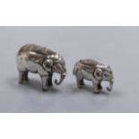 Two small novelty silver elephant pin cushions, Saunders & Shepherd, Birmingham, 1905? & Adie &