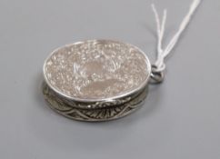 A Victorian engraved silver oval vinaigrette by Charles Washington Shirley Deakin, Birmingham, circa