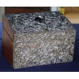 An Edwadian silver-mounted and leather-covered stationery box, decorated with pierced floral and