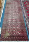 A Bokhara style hall carpet and North Western Persian style runner Larger 100 x 86cm