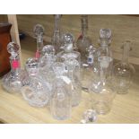 A collection of thirteen glass decanters