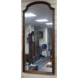 A wall mirror H.136cm