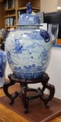 A large Chinese crackleglaze blue and white jar and cover, wood stand height 93cm