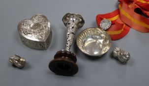 A Chinese white metal spill vase on stand, a taste vin, a Chinese spoon, two white metal boxes and a