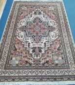 A Tabriz rug 274 x 190cm