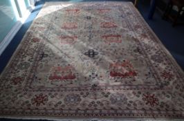 A Persian fawn ground carpet 380 x 276cm