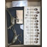 A four-piece silver-mounted dressing table set, cased, a silver cigarette box and sundries,