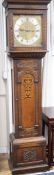 A reproduction inlaid carved oak chiming longcase clock, marked Maple, London H.196cm