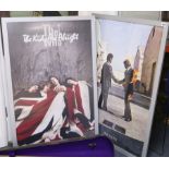 Two framed music album posters, The Who and Pink Floyd