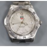 A gentleman's stainless steel Tag Heuer Professional quartz wrist watch, no box or papers.