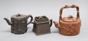 Three Chinese Yixing teapots height 16cm