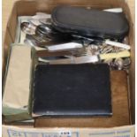 A large quantity of assorted plated flatware including sets, fish servers, carving set, cased fish