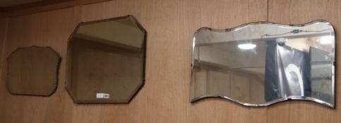 Three Art Deco style frameless wall mirrors Largest W.69cm